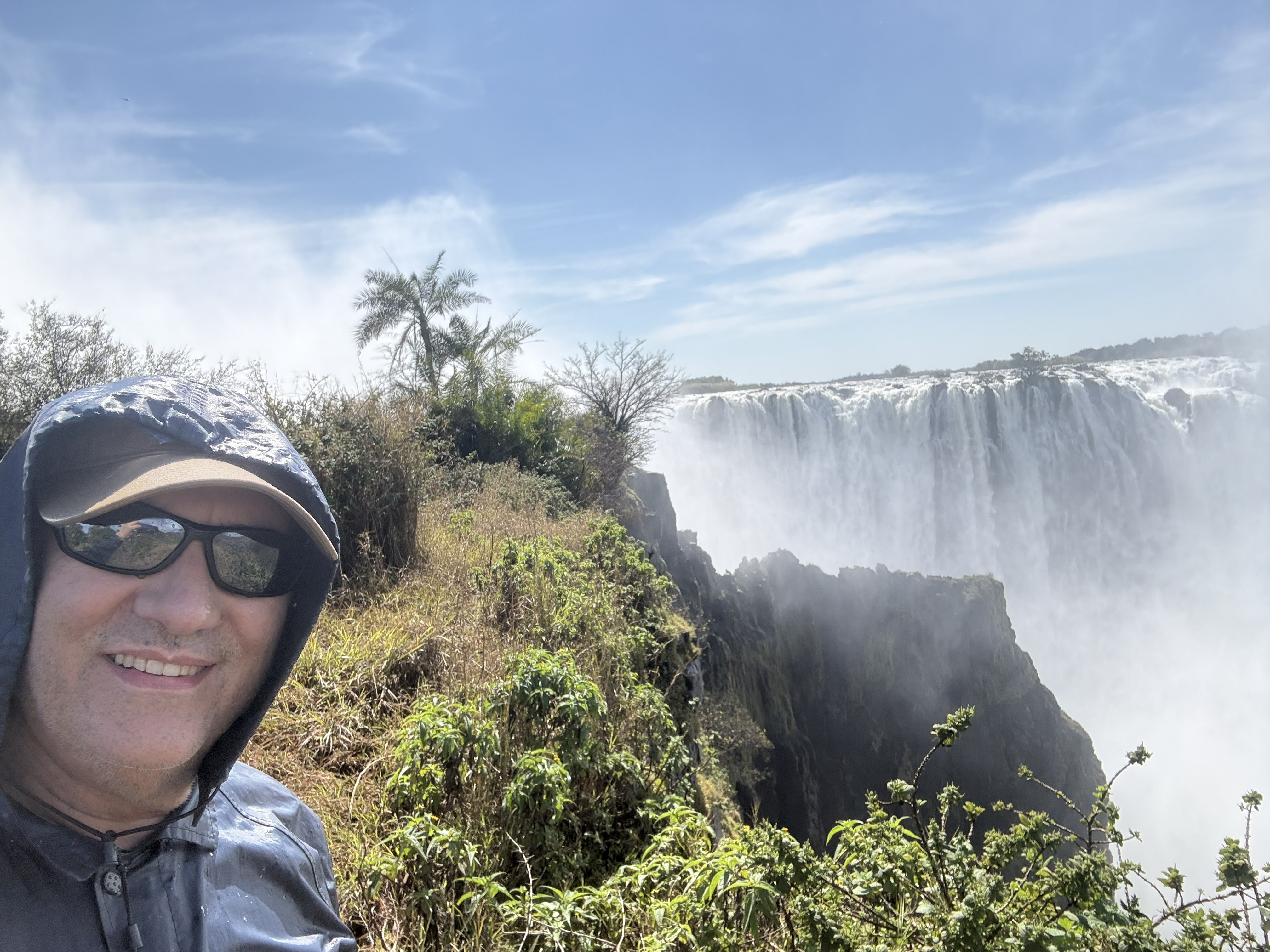 The same stretch. “Dangerous when wet” is not advice at Victoria Falls; it is a description of the entire path.