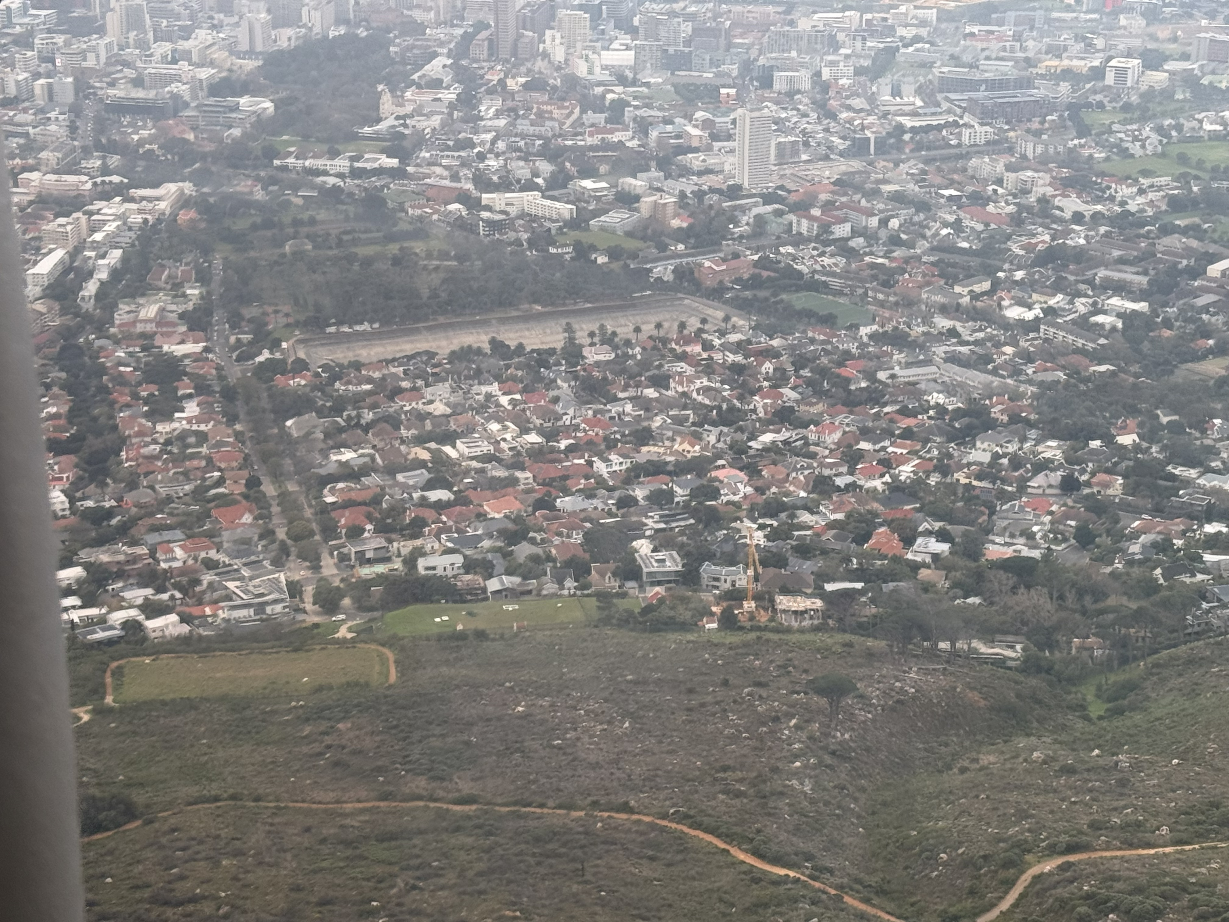 And the view that makes the whole cable car worth it: Cape Town spread out below, the suburbs running down to the sea, the city looking small and orderly and very far from the isla