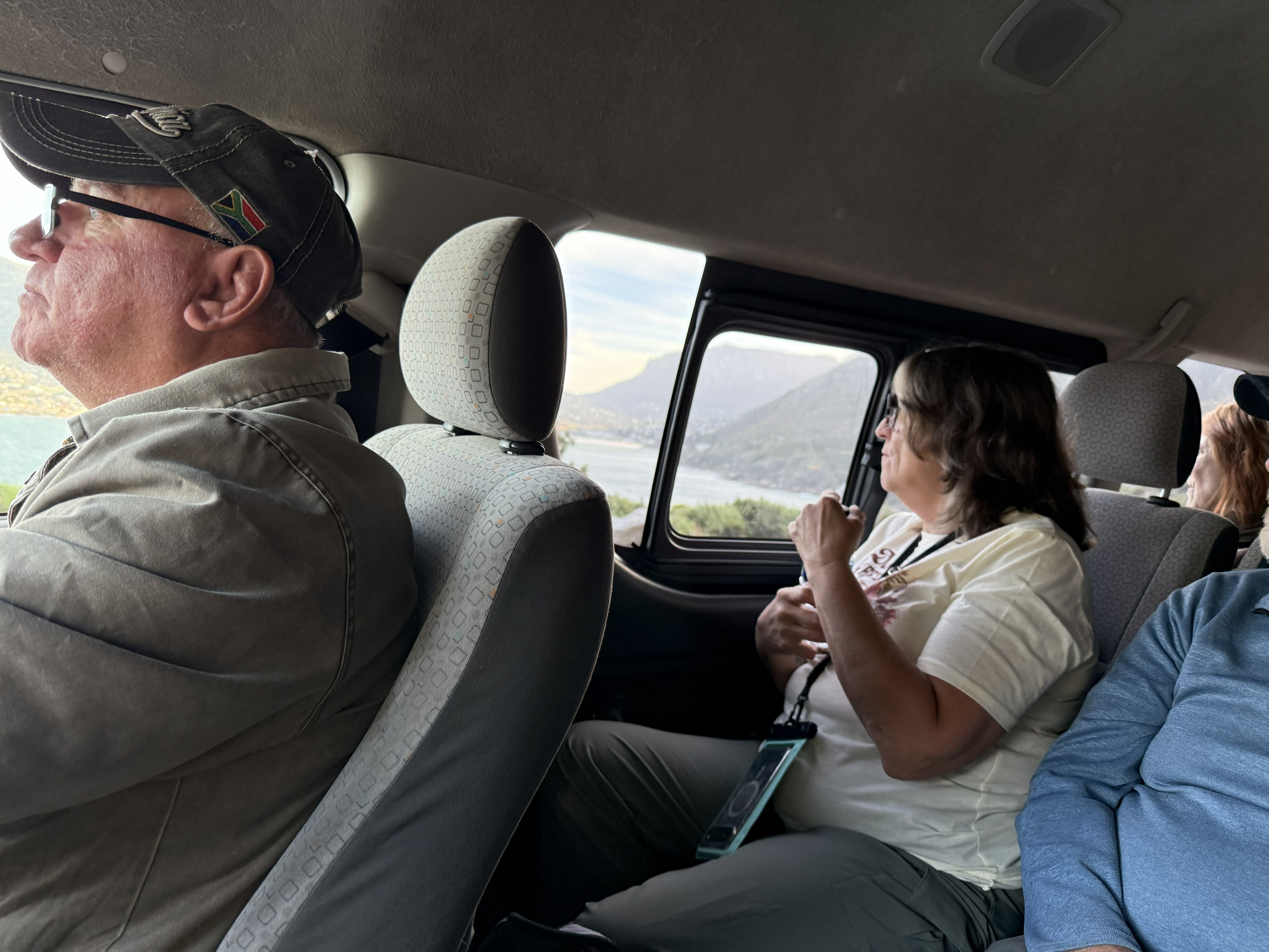 The front seat, mine from this stop onward — up beside Eric for the rest of the way. The view improved considerably, and so did my knees.
